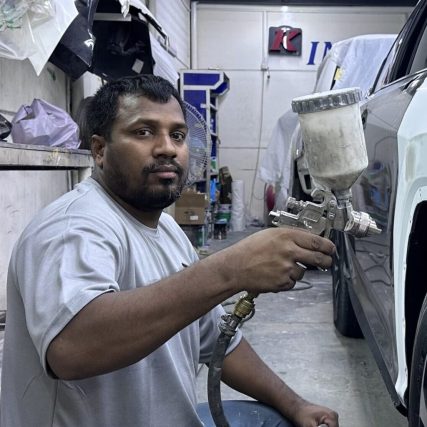 Bab Al Salam Mechanic Painting The Car