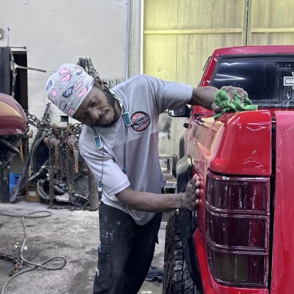 Bab Al Salam Mechanic Sanding the body