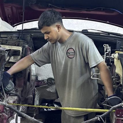 Bab Al Salam Mechanic Working on engine 4